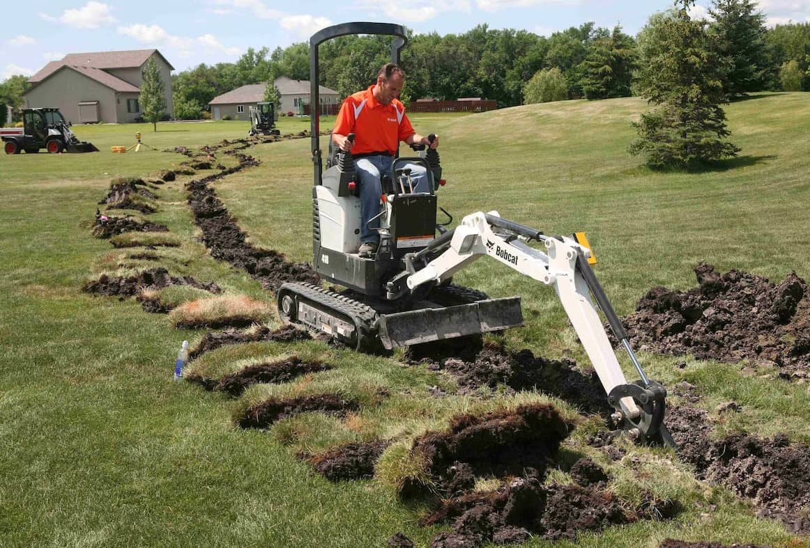 dig a trench using bobcat small escavator